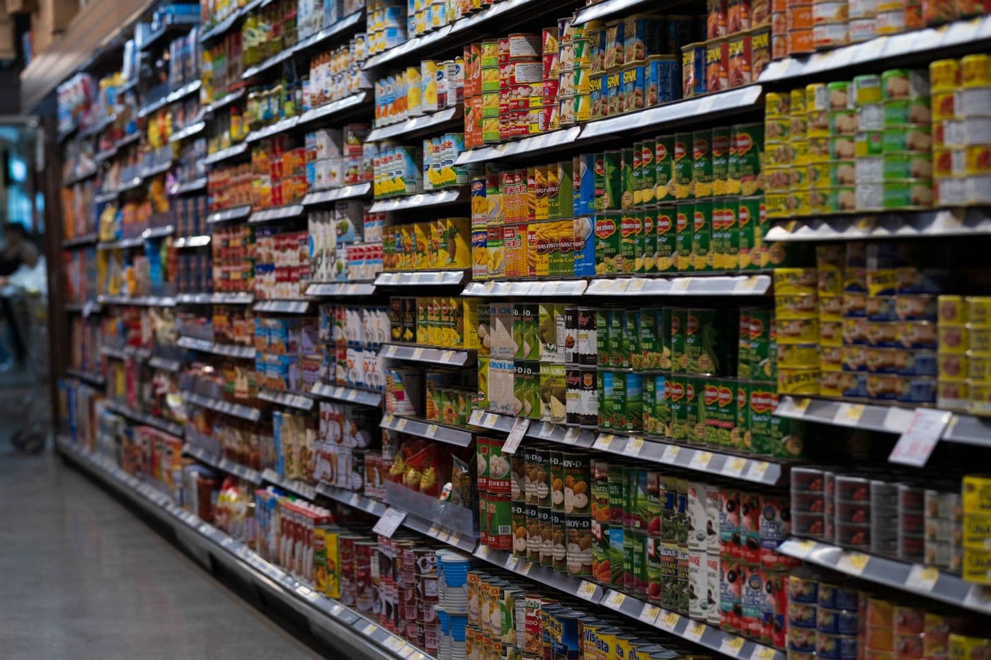 Fully stocked shelves running down an aisle at Bobby's Discount Store in Orange, NJ