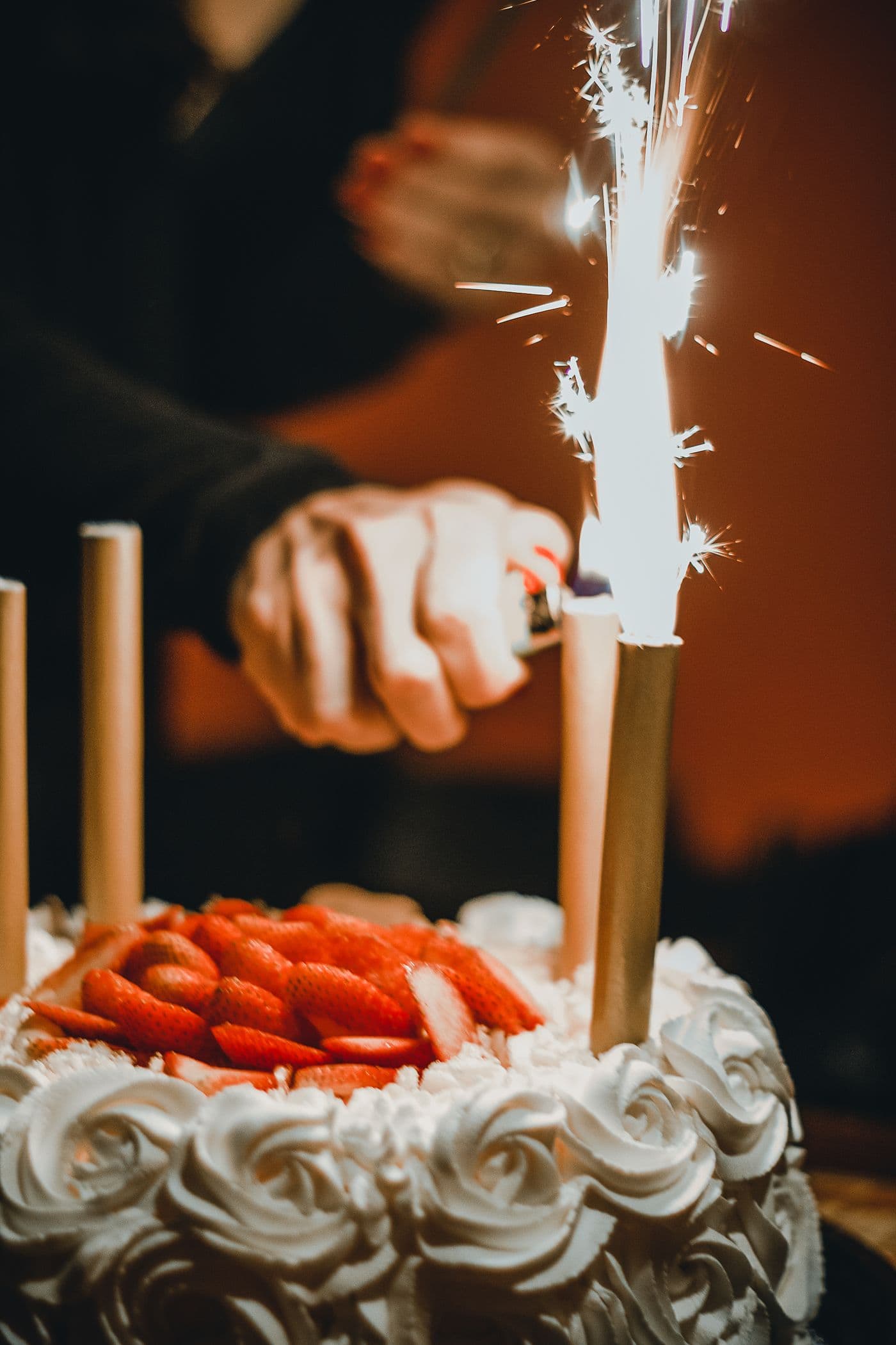 A party celebration cake with a sparkler